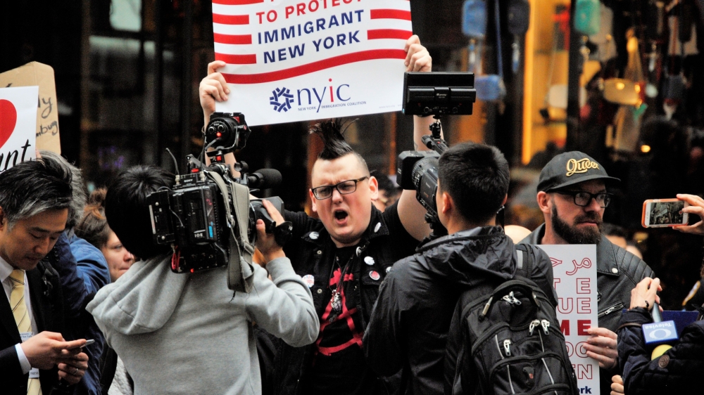 Protestor outside Trump Tower, New York - event photography