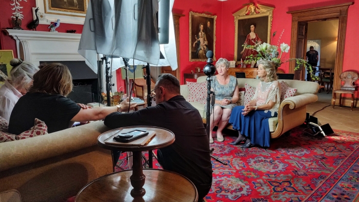 Actresses rehearse dialogue in exquisite lounge